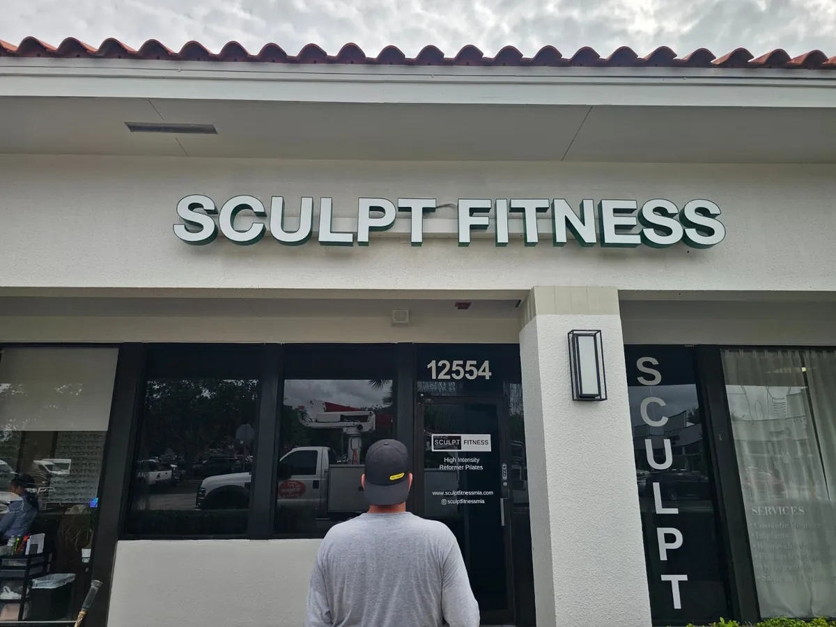 Illuminated channel letters on a storefront, made and installed by Spazio Design